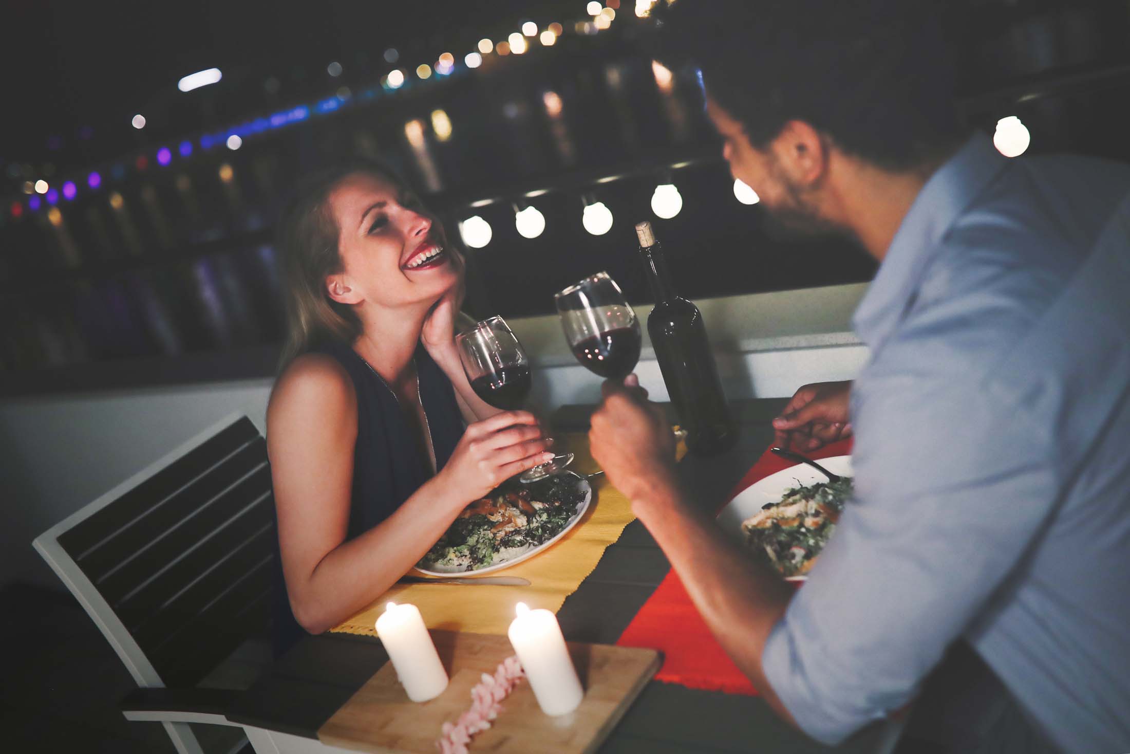 Young Beautiful Couple Having Romantic Dinner On Rooftop Auburn Homes